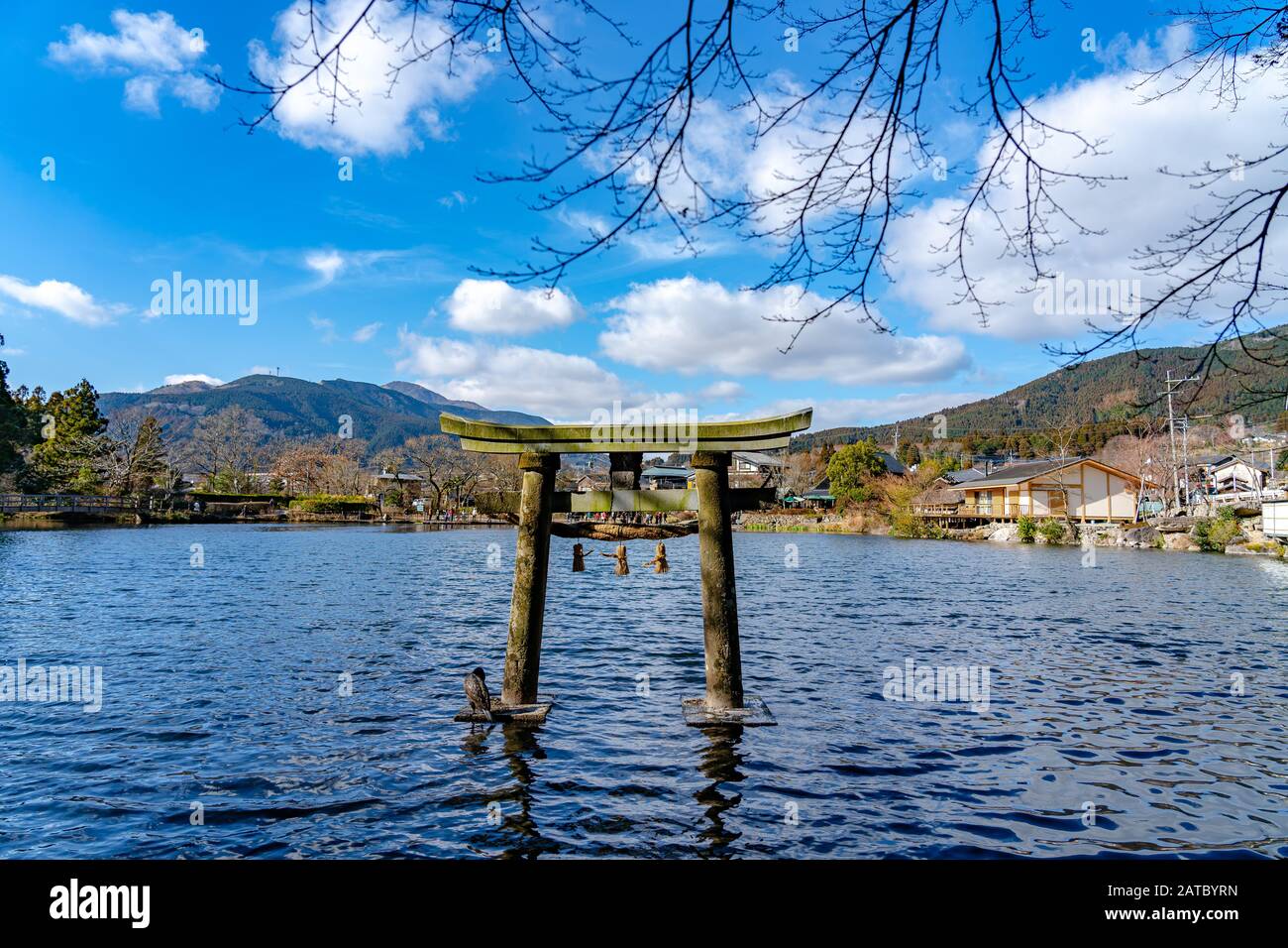 Golden Scale Lake and Yufu Mountain in winter sunny day with clear blue sky. This popular sightseeing spot commonly viewed and photographed by tourist Stock Photo