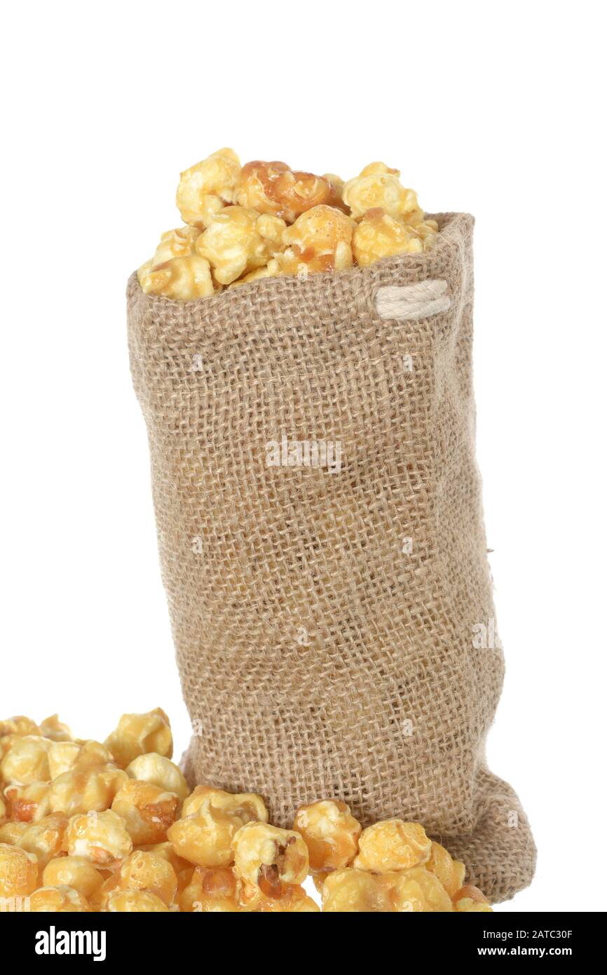 Caramelized popcorn on table Stock Photo