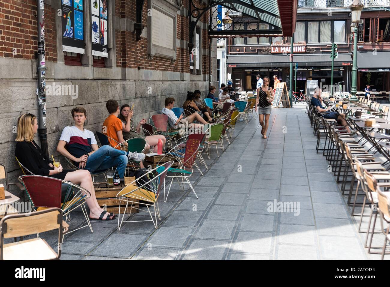 Brussels Old Town / Belgium - 06 25 2019: Young people having a drink at the terraces of the Halles Saint-Géry -  Sint Goriks Hallen Stock Photo