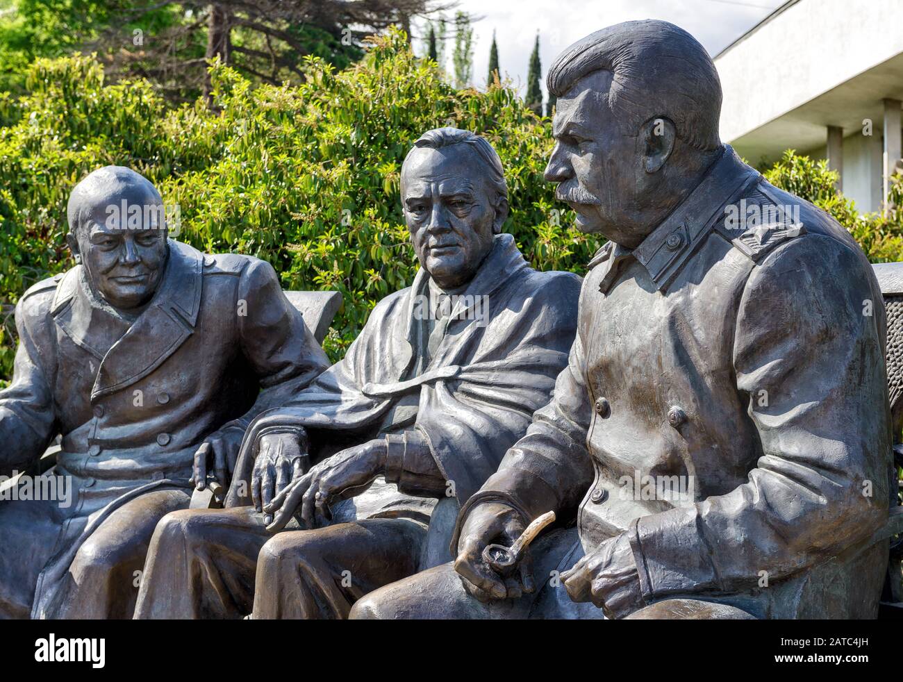 LIVADIA, RUSSIA - MAY 17, 2016: Soviet leader Stalin with Churchill and Roosevelt. Statue by Zurab Tsereteli in the Livadia Palace, Crimea, Russia. Th Stock Photo