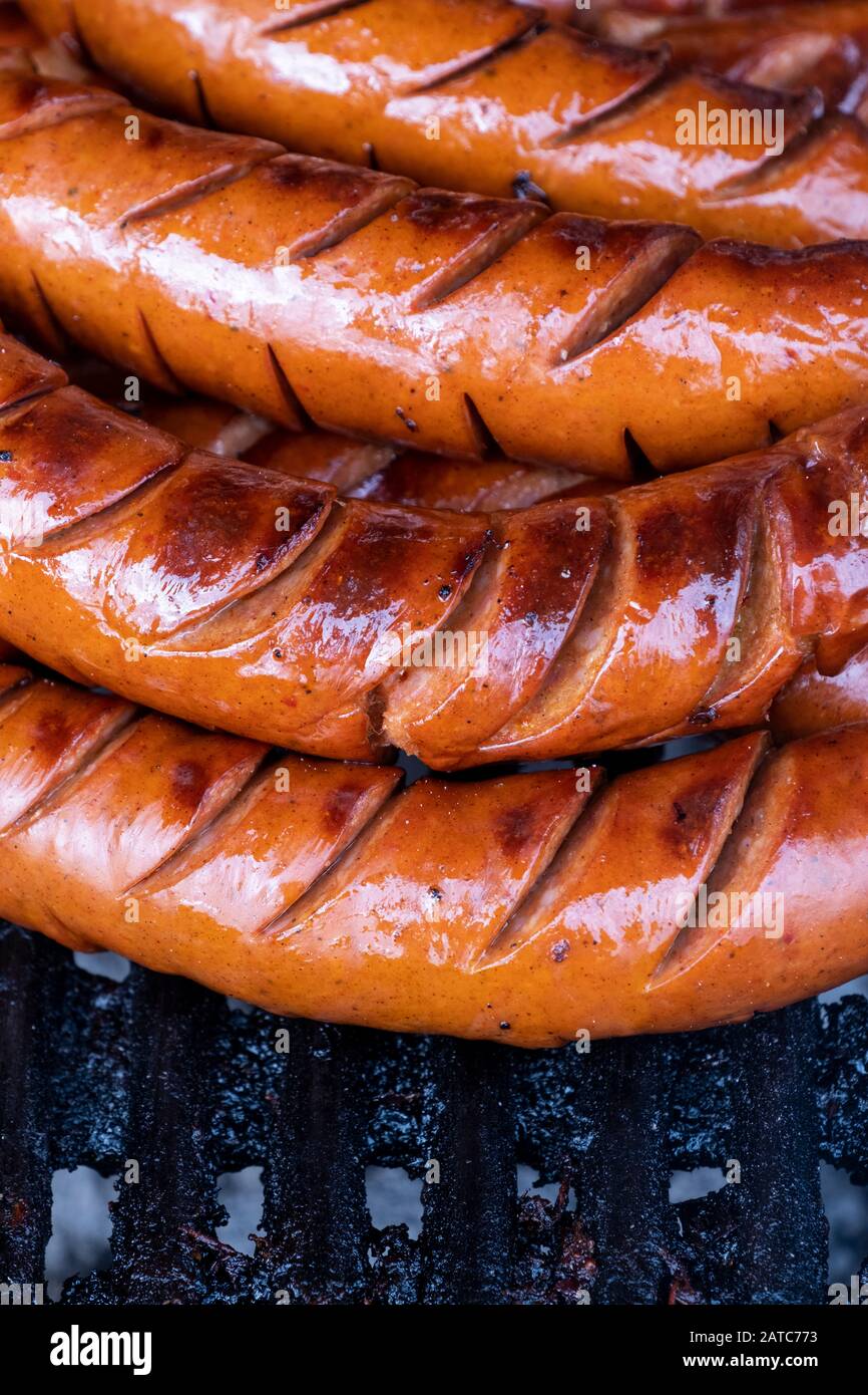 Juicy sausages grilled on the bbq Stock Photo