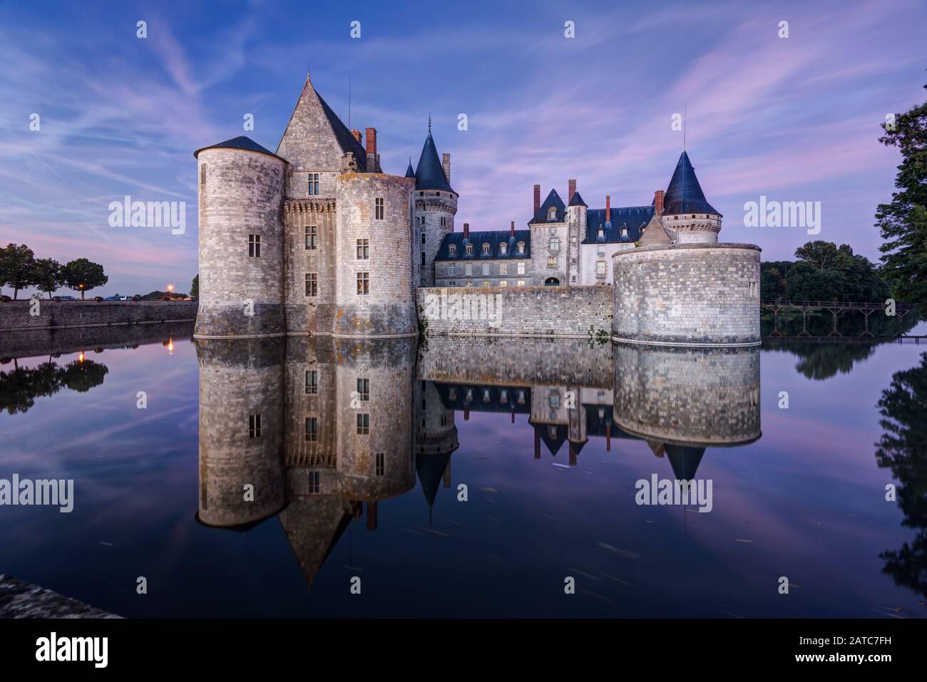 The chateau of Sully-sur-Loire at night, France. This castle is located in the Loire Valley, dates from the 14th century and is a prime example of med Stock Photo
