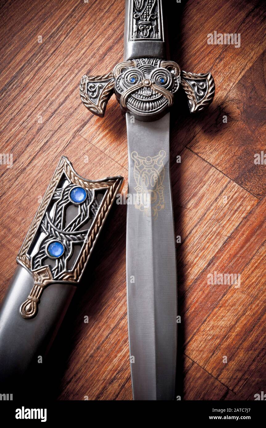 Viking dagger with decorated handle Stock Photo - Alamy