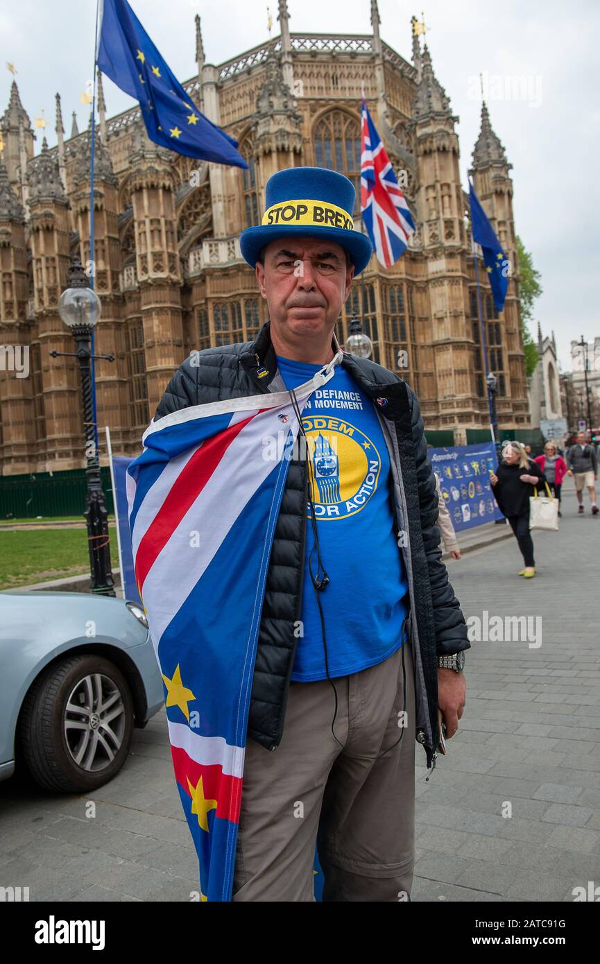 Westminster, London, UK. 1st May, 2019. Mr Stop Brexit, Steve Bray, wears his Stop Brexit Hat outside the Houses of Parliament. Credit: Maureen McLean/Alamy Stock Photo