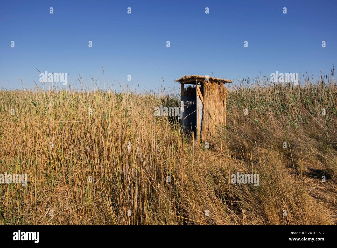 Toilet from the straw in the steppe Stock Photo