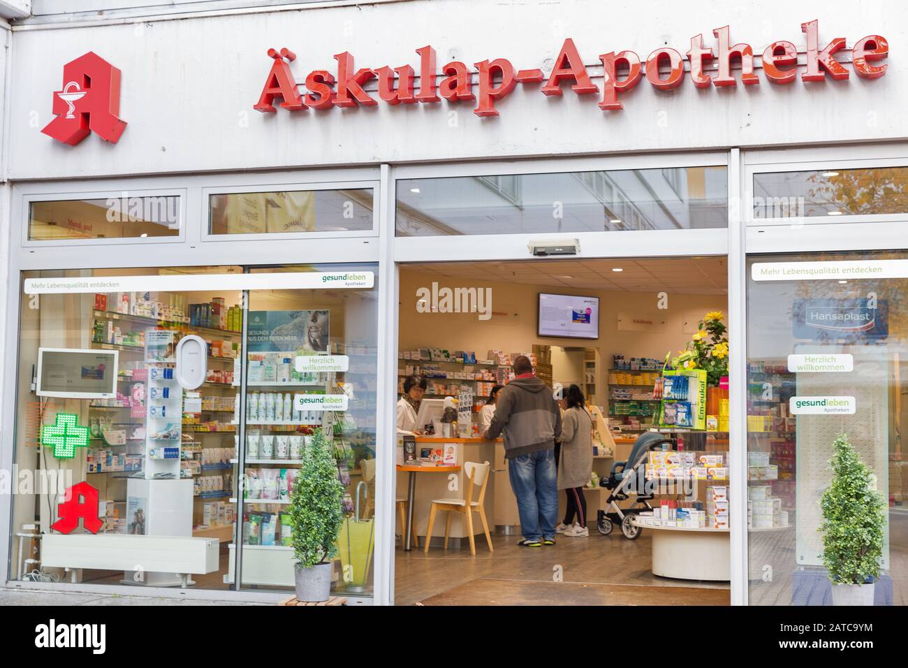 BERLIN, GERMANY - NOVEMBER 18, 2019: People visit Gesundleben Askulap-Apotheke pharmacy in Markisches Trade Center. Berlin is the capital and largest Stock Photo