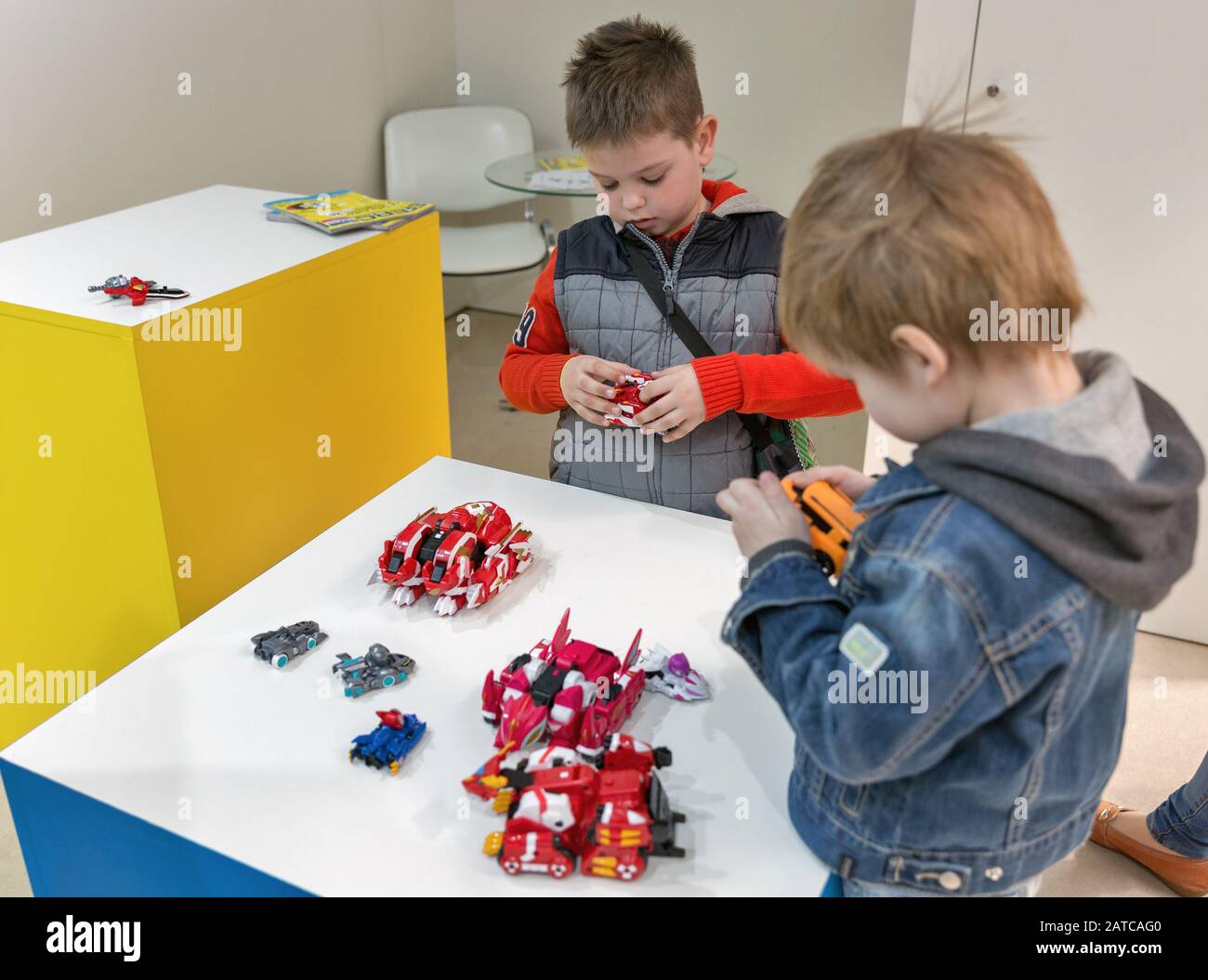 KYIV, UKRAINE APRIL 06, 2019 Kids visit transformers toys producer