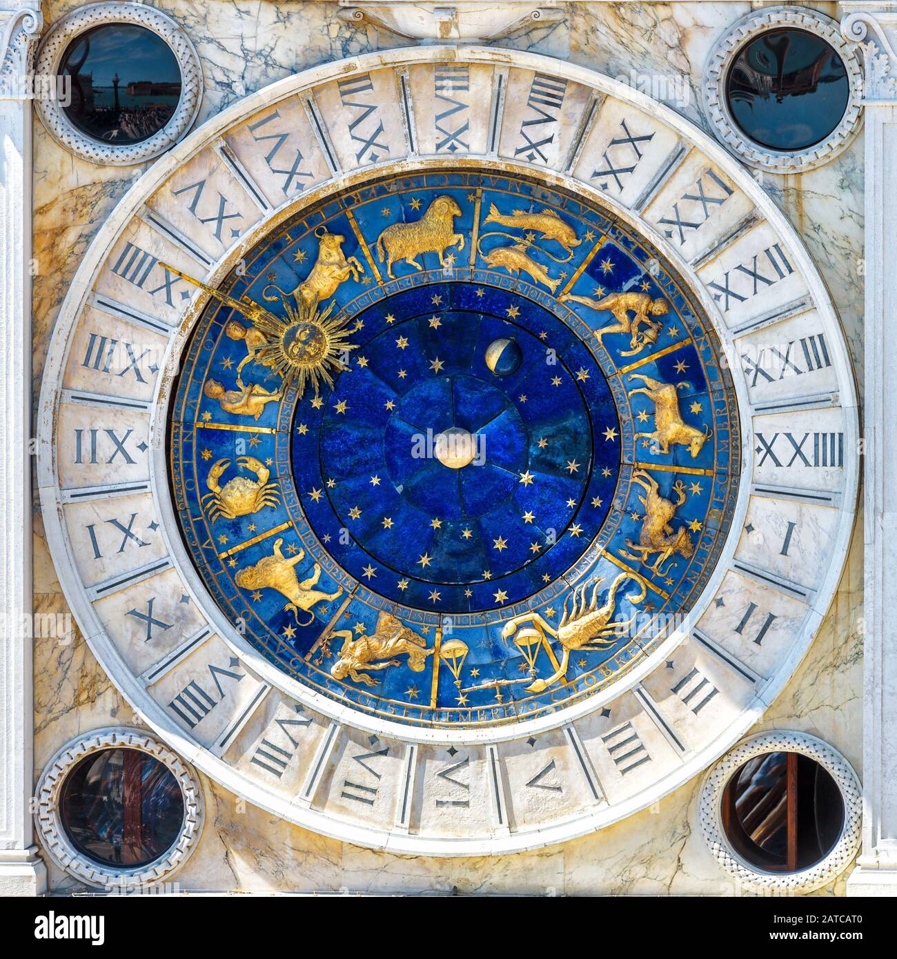 Ancient clock Torre dell'Orologio with Zodiac signs, Venice, Italy. It is old landmark of Venice. Medieval mechanism with vintage symbols of astrology Stock Photo