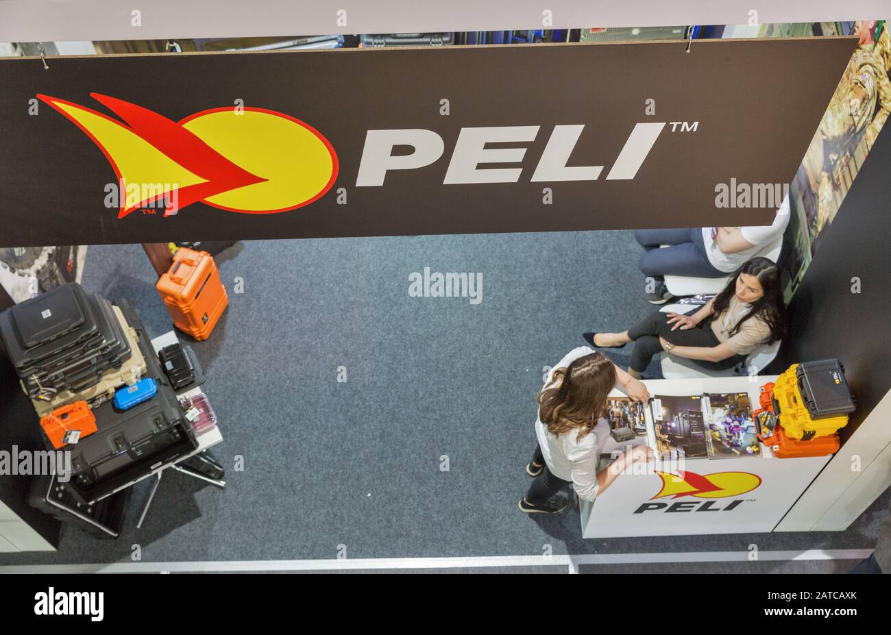 KYIV, UKRAINE - APRIL 06, 2019: People visit Pelican Products booth, a company that manufactures temperature controlled packaging and protective cases Stock Photo