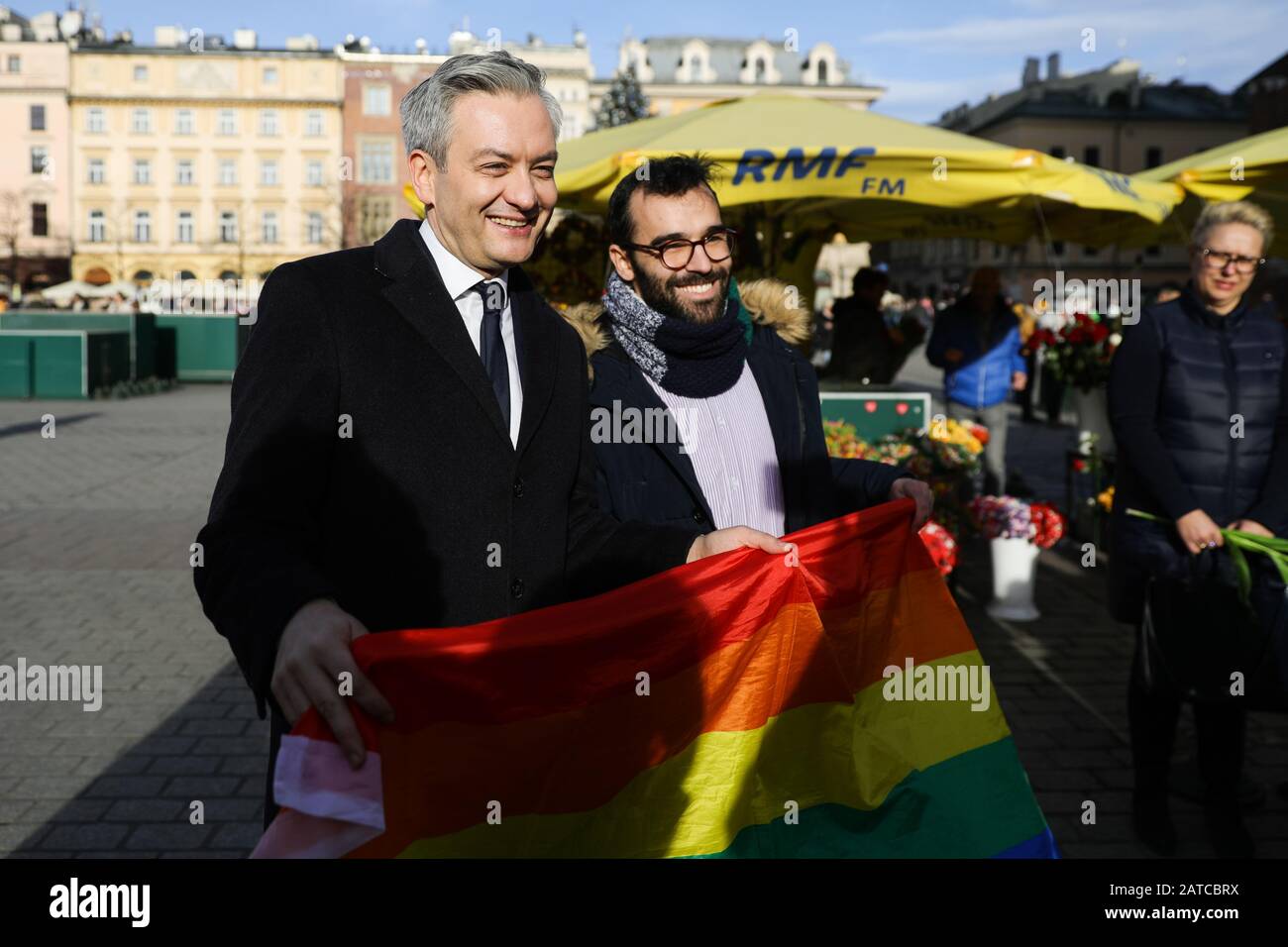 Robert Biedron poses for a photo with a Spanish Erasmus student, a member of the LGBT community after the campaign.Robert Biedron, member of the European parliament and an openly homosexual moderate left-wing presidential candidate started his campaign before the presidential elections in Poland. Although Poland is associated with traditionalism, he is gaining support among the young people with liberal and/or left-wing views in opposition to the right-wing conservatism of the current president. He is the first member of the Polish LGBT community with a chance to take such a high position in t Stock Photo