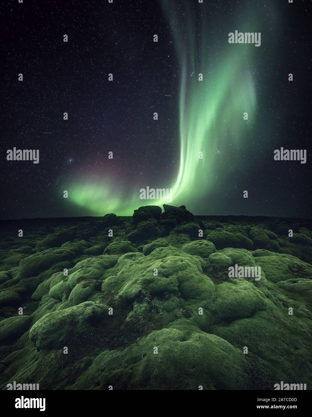 Northern lights over a moss covered Lava plain, Iceland Stock Photo