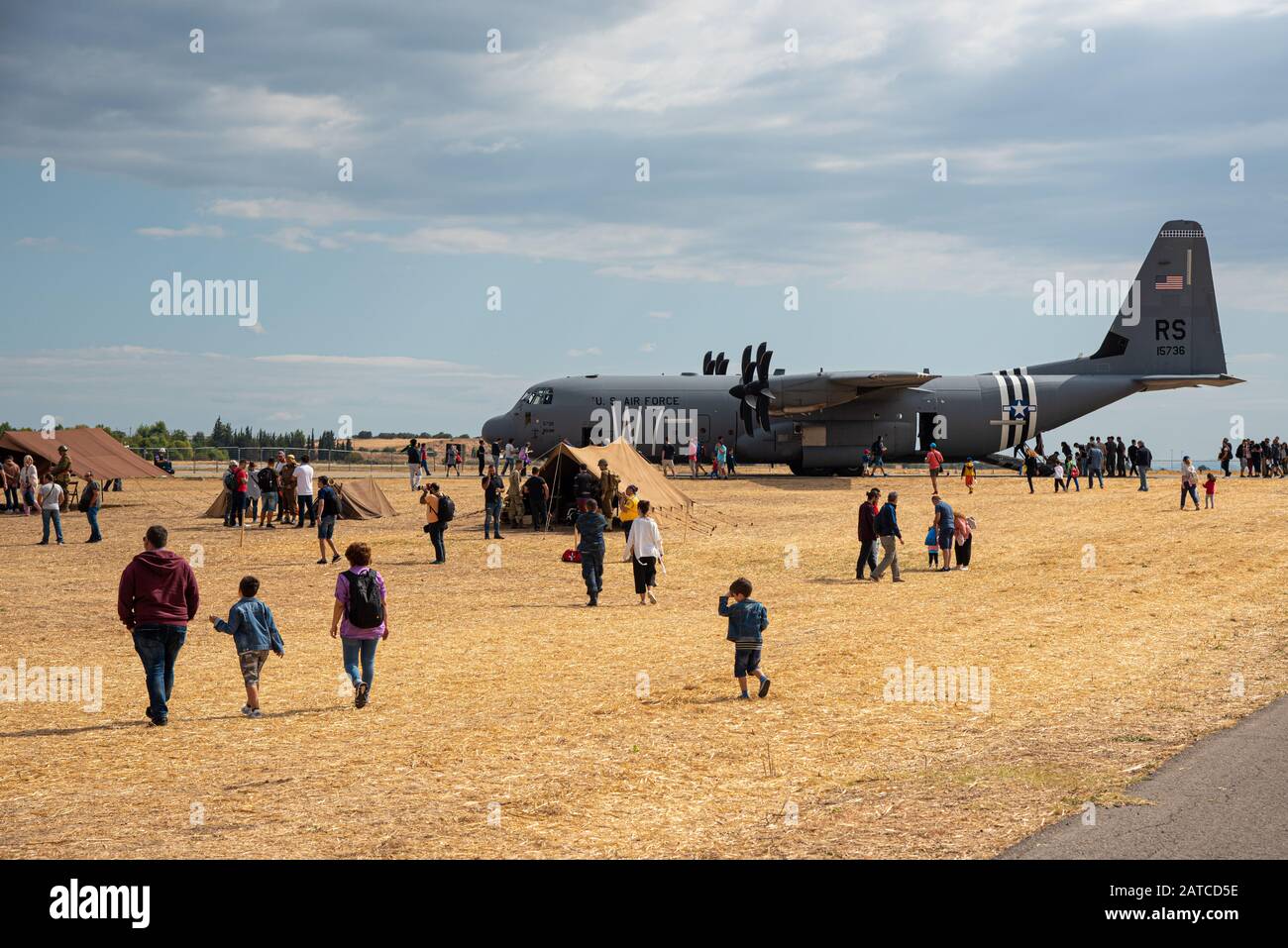 People at the Athens flying week air show. Tanagra military base visiting usa transhipment aircraft. Stock Photo
