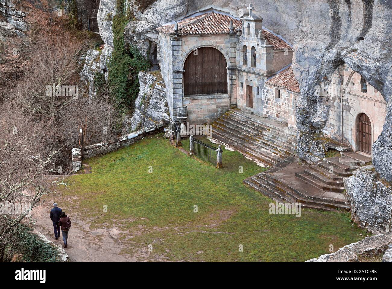 The hermitage of San Bernabé and San Tirso is located at the main entrance of the largest karst complex of Ojo Guareña in Spain, Burgos, Castile-Leon. Stock Photo