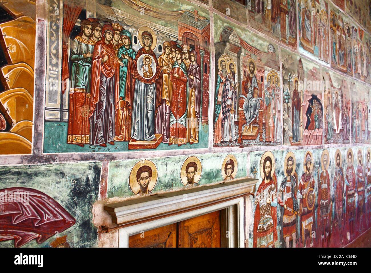 Walls covered in Byzantine icons. The Holy and Great Monastery of Vatopedi – an Eastern Orthodox monastery on Mount Athos, Greece. Stock Photo