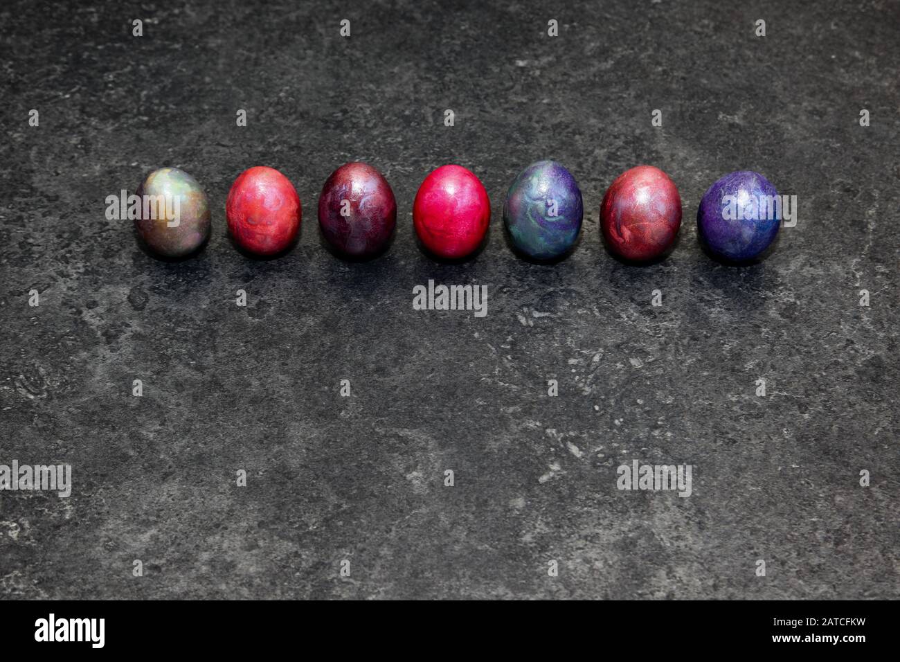 Marbled Easter eggs on black background Stock Photo