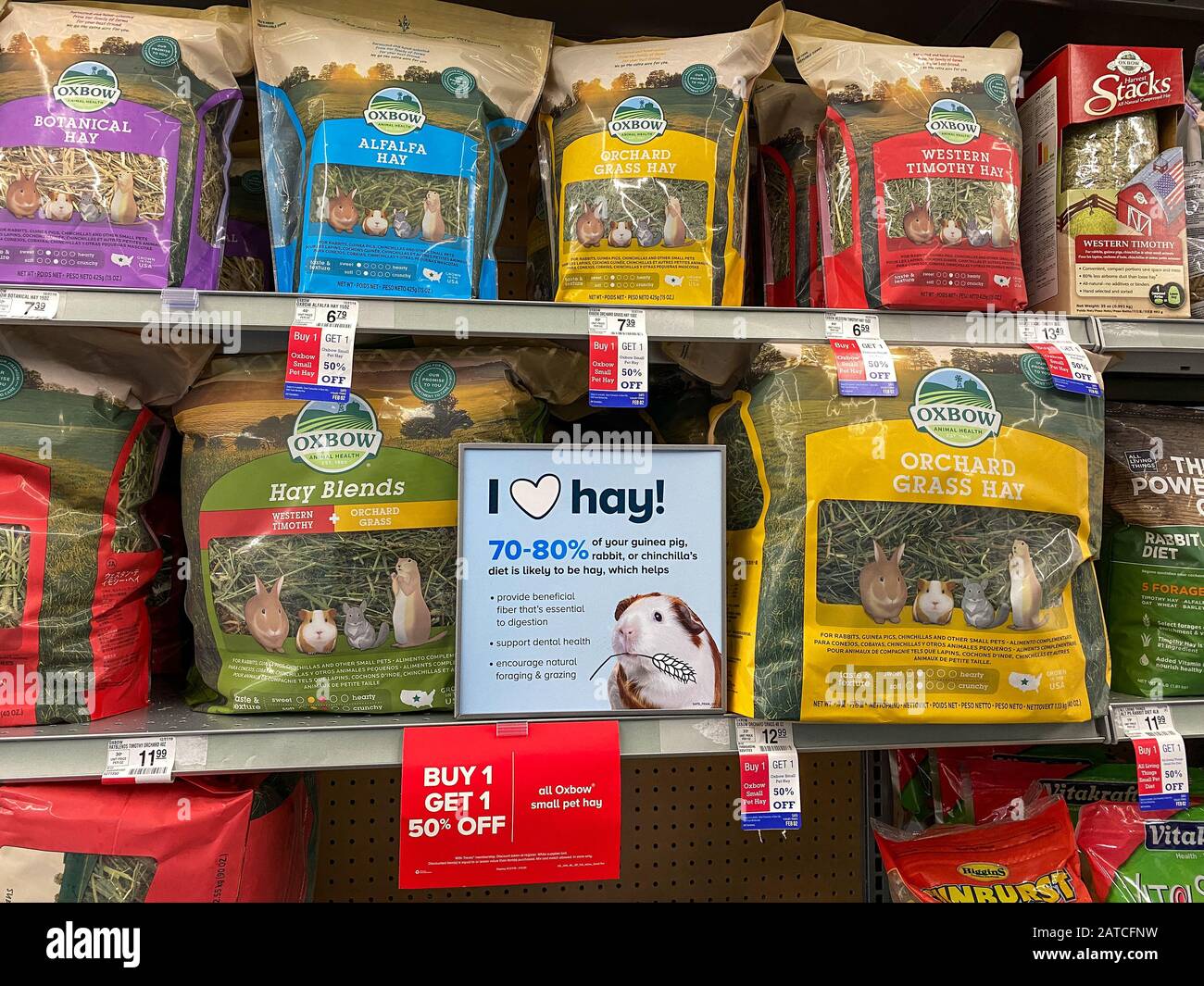 Orlando, FL/USA-1/29/20: A display of hay which is food for rabbits, gunea pigs or chinchillas at a Petsmart Superstore ready for pet owners to purcha Stock Photo