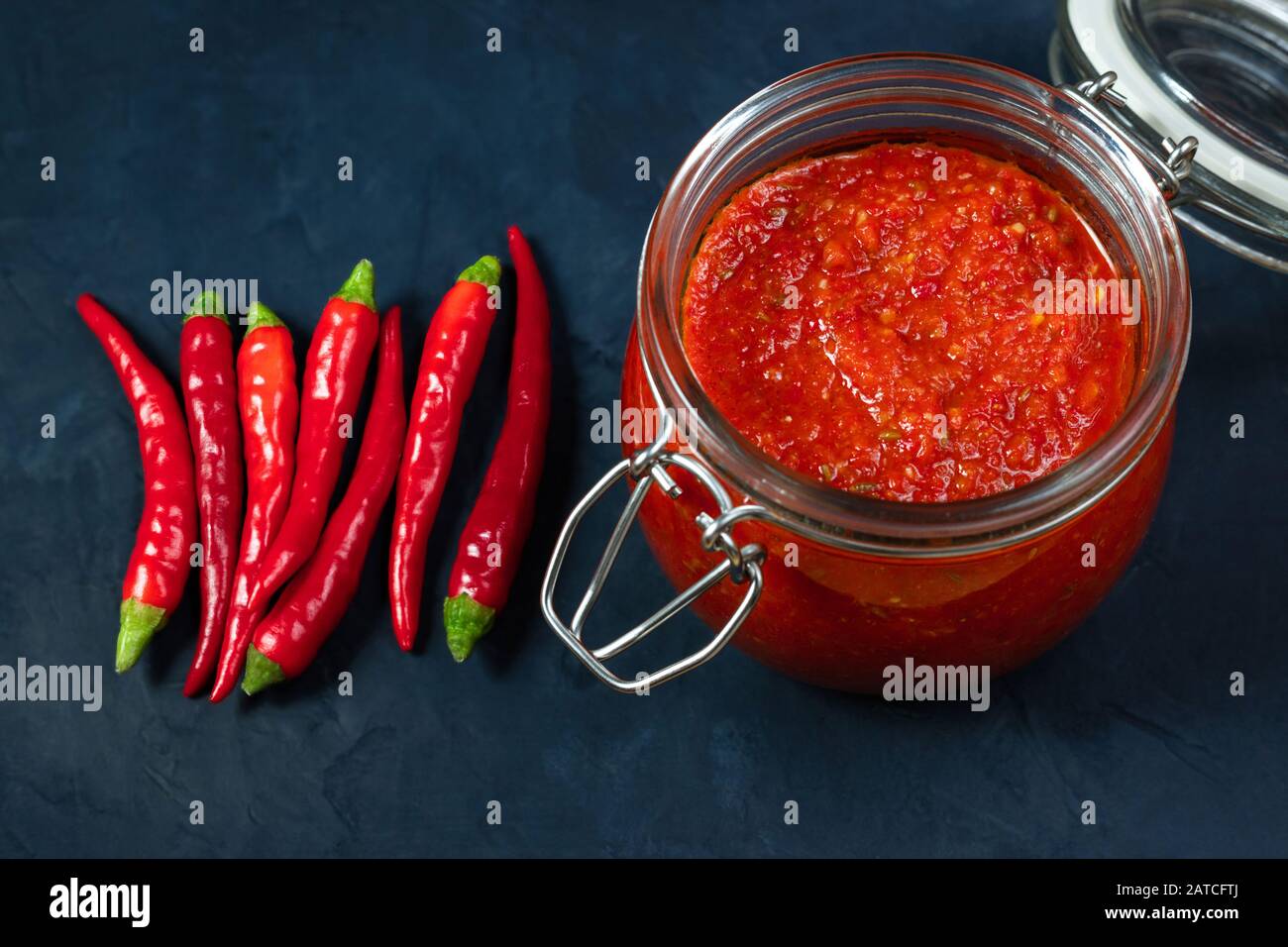 Hot chili pepper sauce paste harissa. Adjika. Traditional Tunisia