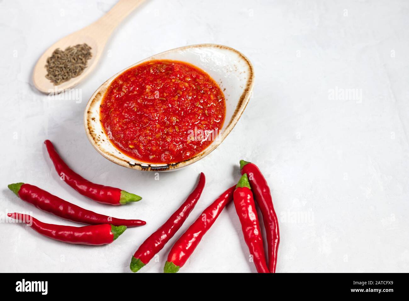 Hot chili pepper sauce paste harissa. Adjika. Traditional Tunisia