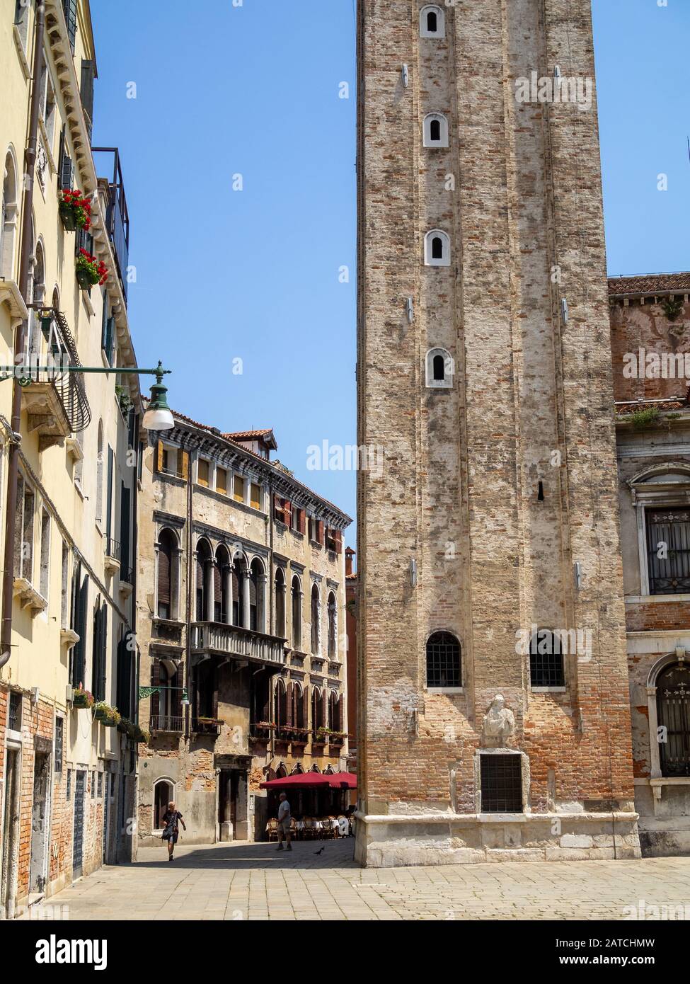 Old church tower in a corner of a Venice street Stock Photo