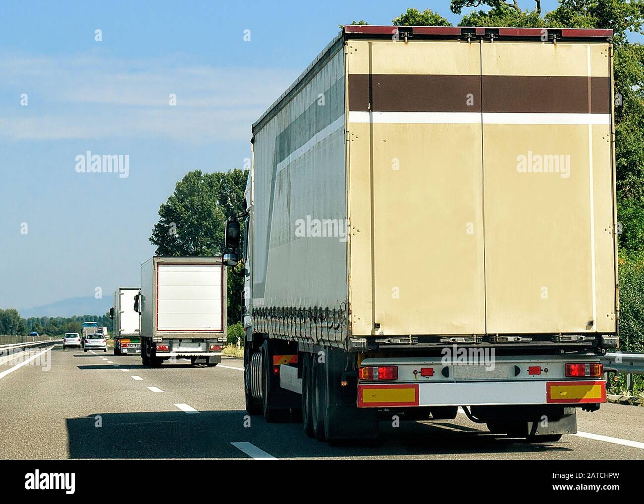 Trucks on roadway in Switzerland Stock Photo - Alamy