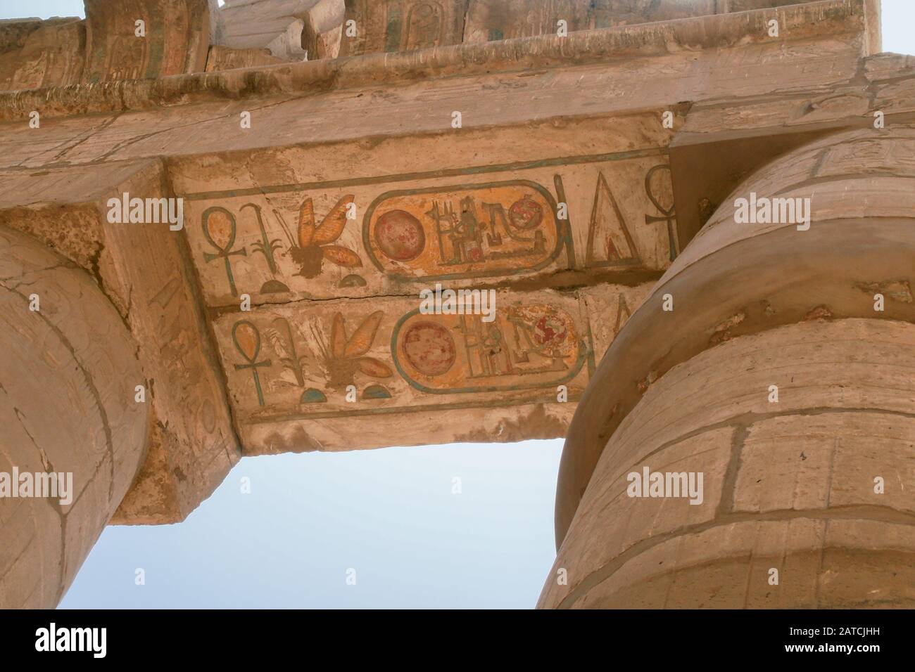 Luxor, Karnak, Egypt, Africa. Temple of Karnak. Looking up. Painted and carved relief hieroglyphics. Stock Photo