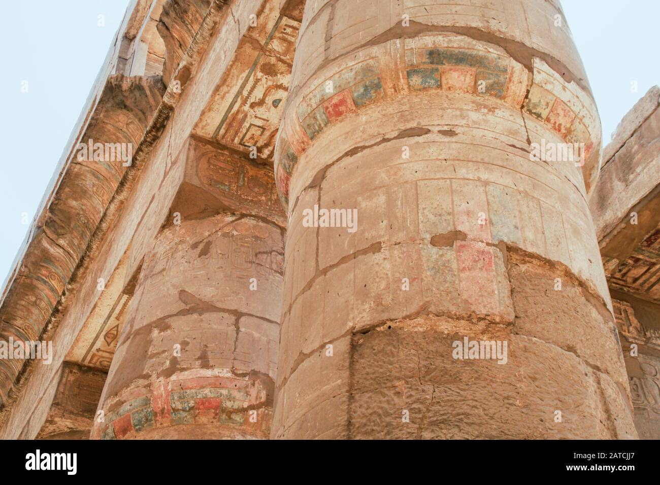 Luxor, Karnak, Egypt, Africa. Temple of Karnak. Looking up. Painted and carved hieroglyphics. Stock Photo