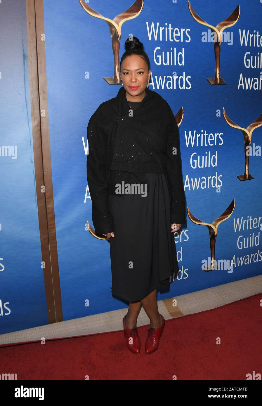 Beverly Hills, USA. 01st Feb, 2020. Aisha Tyler walks the carpet at the 2020 Writers Guild Awards held at the Beverly Hilton Hotel on February 1, 2020 in Beverly Hills, CA, USA. (Photo by Sthanlee B. Mirador/Sipa USA) Credit: Sipa USA/Alamy Live News Stock Photo