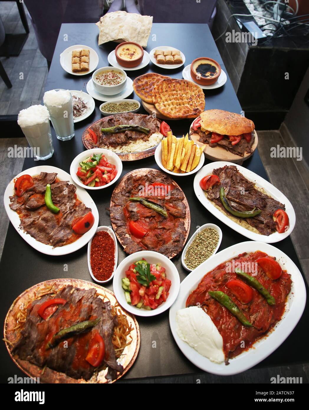 Turkish Doner Kebab with appetizer food in restaurant table Stock Photo ...