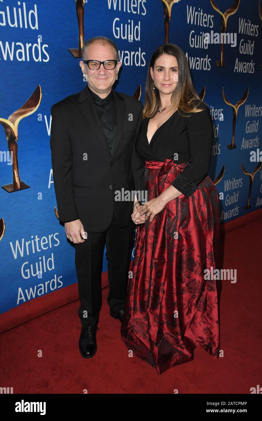 Beverly Hills, USA. 01st Feb, 2020. Javier Grillo-Marxuach and guest walks the carpet at the 2020 Writers Guild Awards held at the Beverly Hilton Hotel on February 1, 2020 in Beverly Hills, CA, USA. (Photo by Sthanlee B. Credit: Sipa USA/Alamy Live News Stock Photo