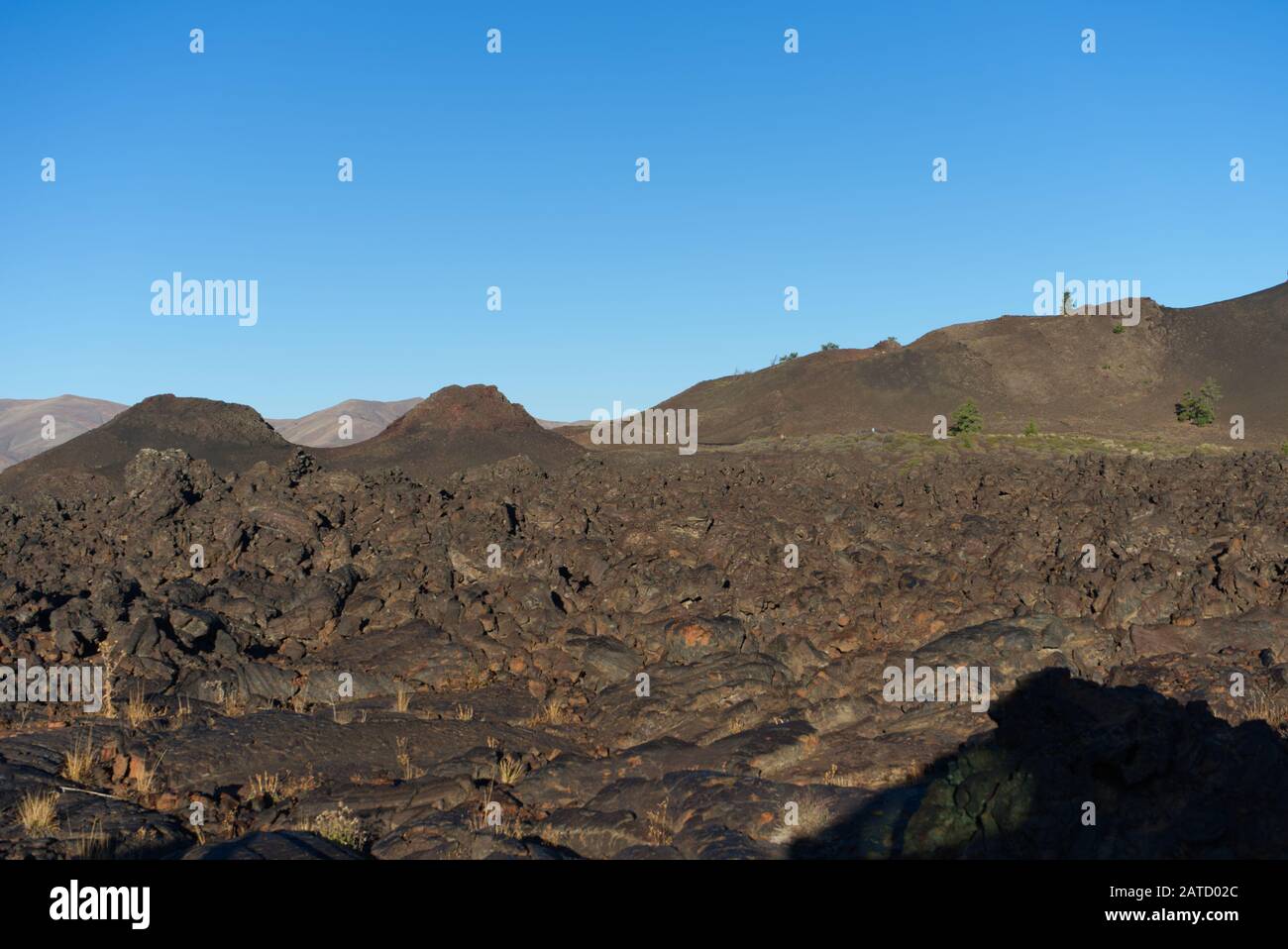 Crater of the moon national monument Lava and rock, blue and brown desert of lava, Idaho, USA Stock Photo
