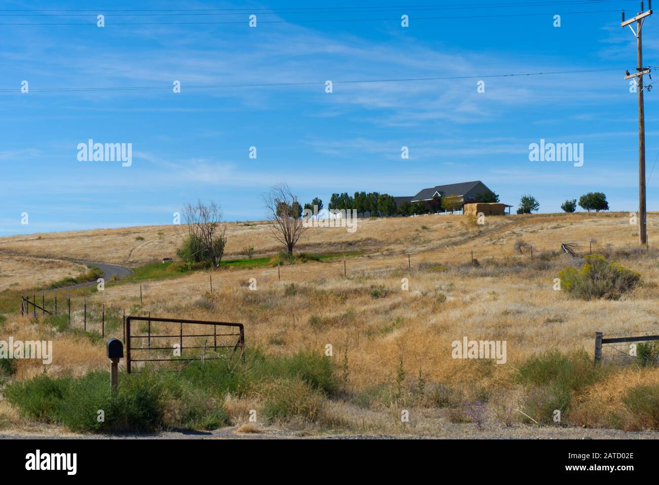 Little house in a prairie, Idaho Farm House, dry September field, along highway 30, Idaho, USA Stock Photo