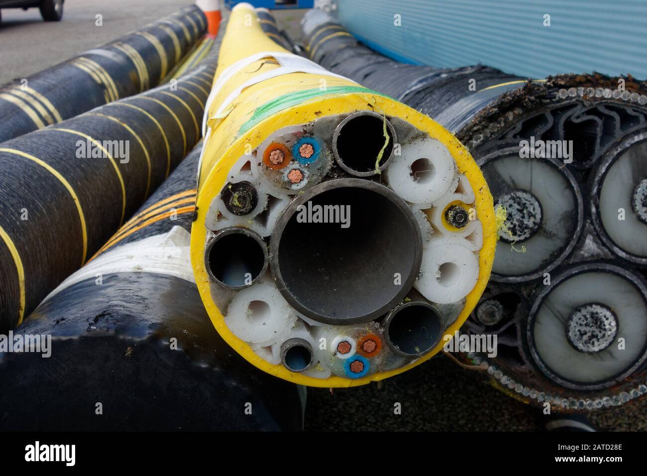 A submarine cable cross section showing the different cores, including flowline, power and signal. Stock Photo