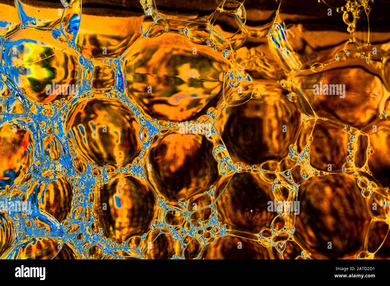 Oil bubbles inside water base form patterns Stock Photo Alamy