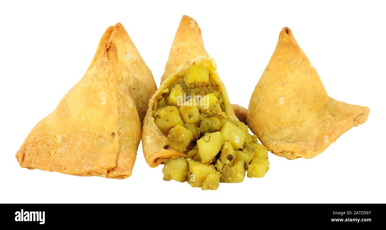 Punjabi style vegetable samosas isolated on a white background Stock Photo