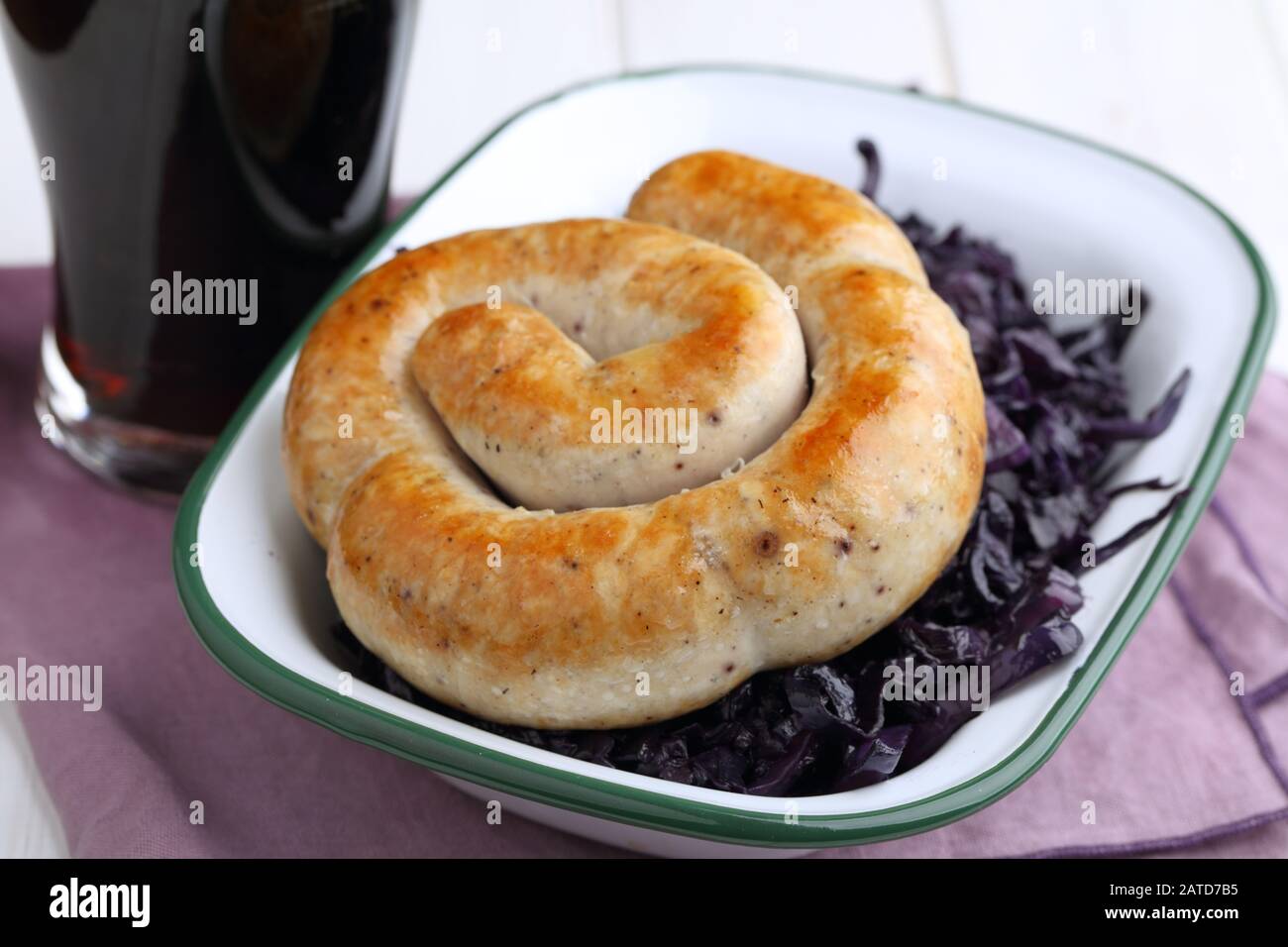 Cumberland Sausage Ring with braised blue cabbage and dark beer Stock