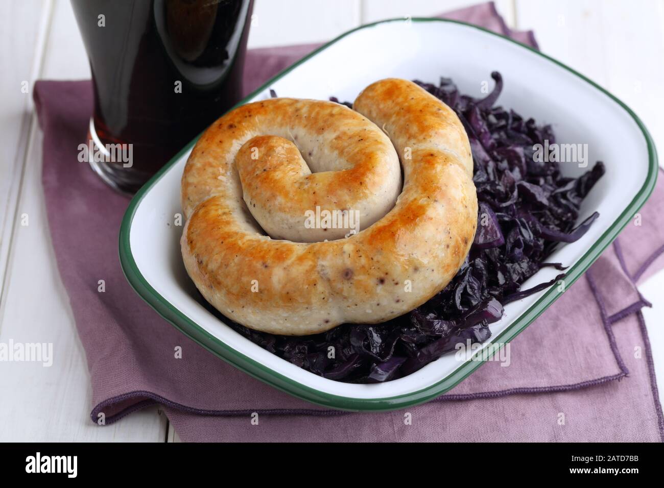 Cumberland Sausage Ring with braised blue cabbage and dark beer Stock