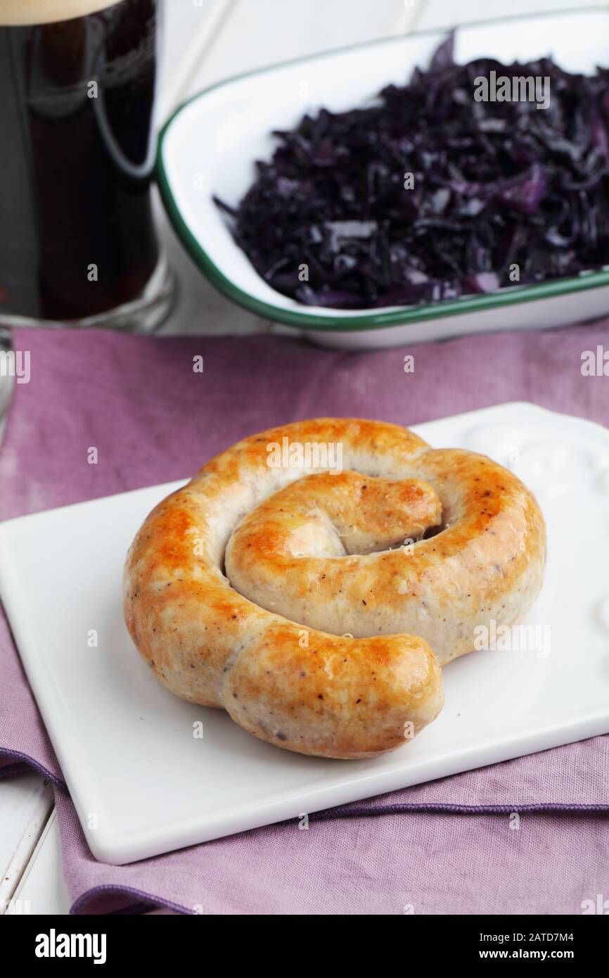 Cumberland Sausage Ring with braised blue cabbage and dark beer Stock