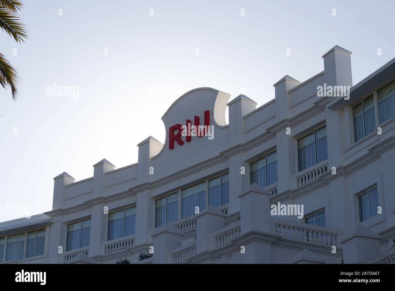 RIU hotel brand name agains clear blue sky Stock Photo