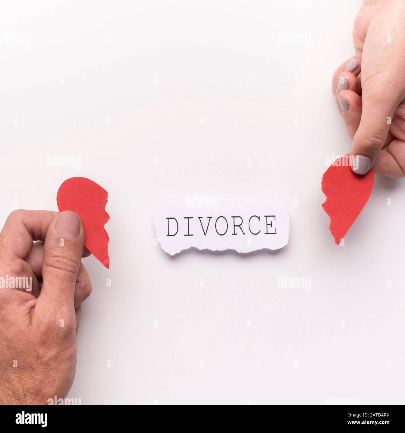Husband and wife planning divorce and holding broken heart Stock Photo