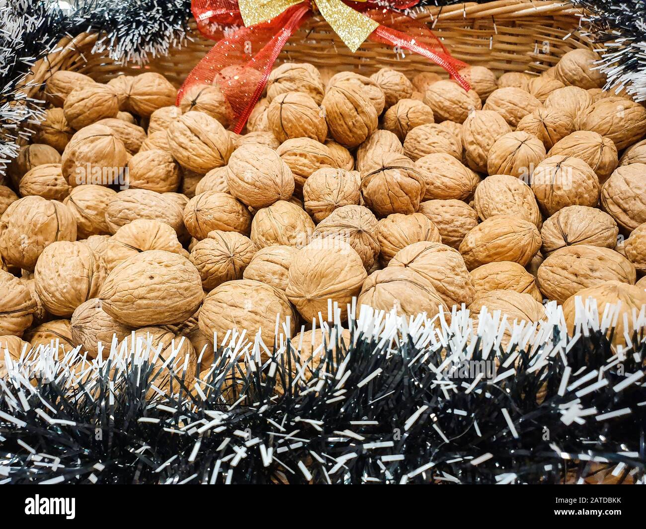 Walnuts in a Christmas basket Stock Photo