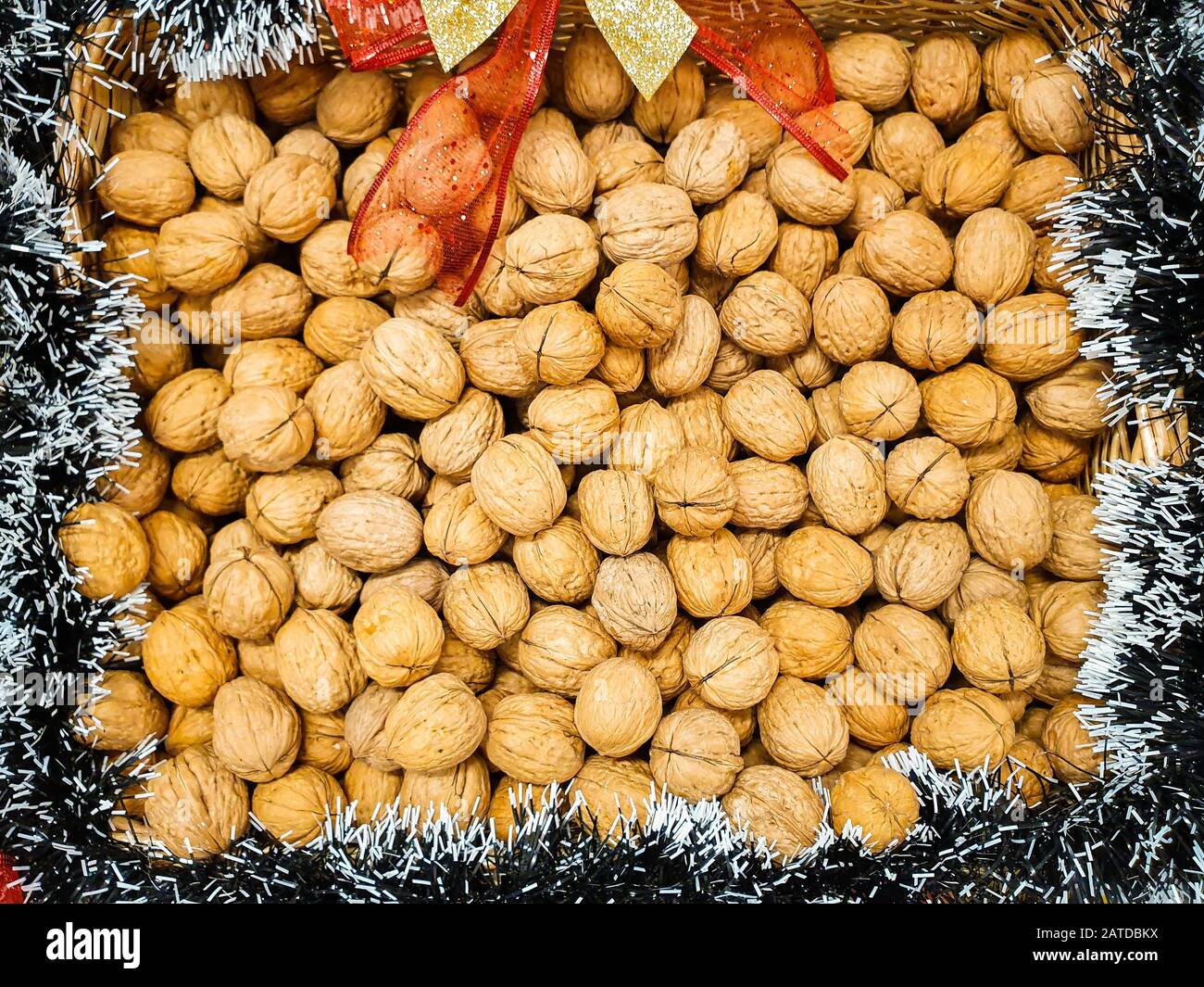 Walnuts in a Christmas basket Stock Photo