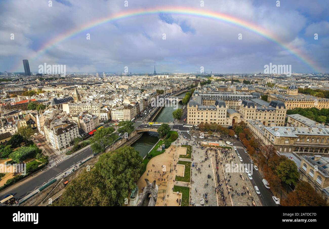 Paris day panorama of city center with rainbow. View from Cathedral Notre Dame de Paris. France. Stock Photo