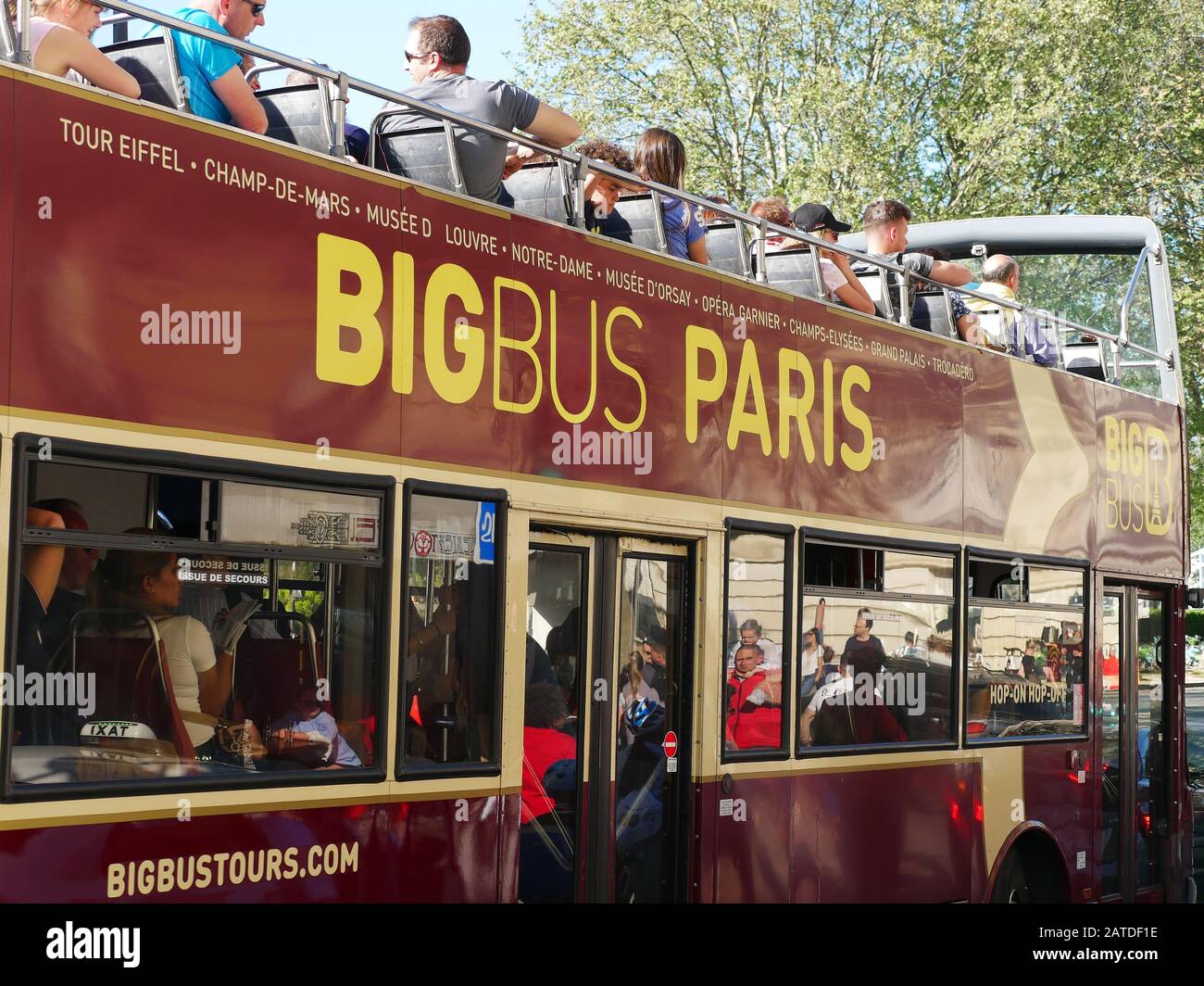 Paris, France - April 2019: city sightseeing double decker touristic bus in downtown Stock Photo