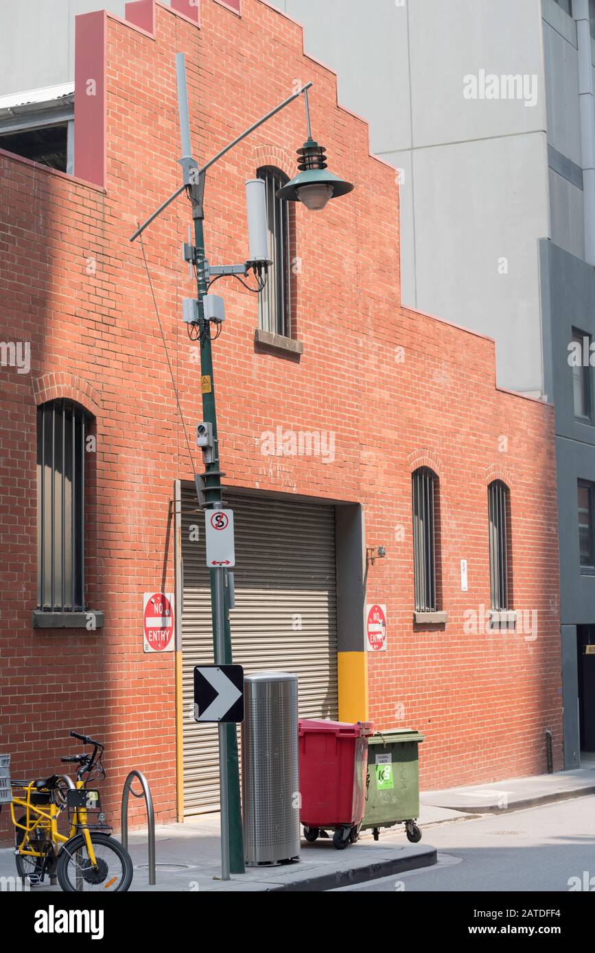 A modern street light in the city of Melbourne complete with free wifi