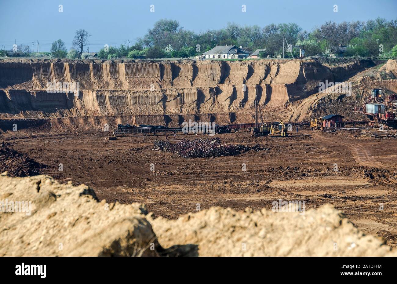 Large appliances excavators in open pit, develop mineral resources, excavator digs, metallurgy in Ukraine Stock Photo