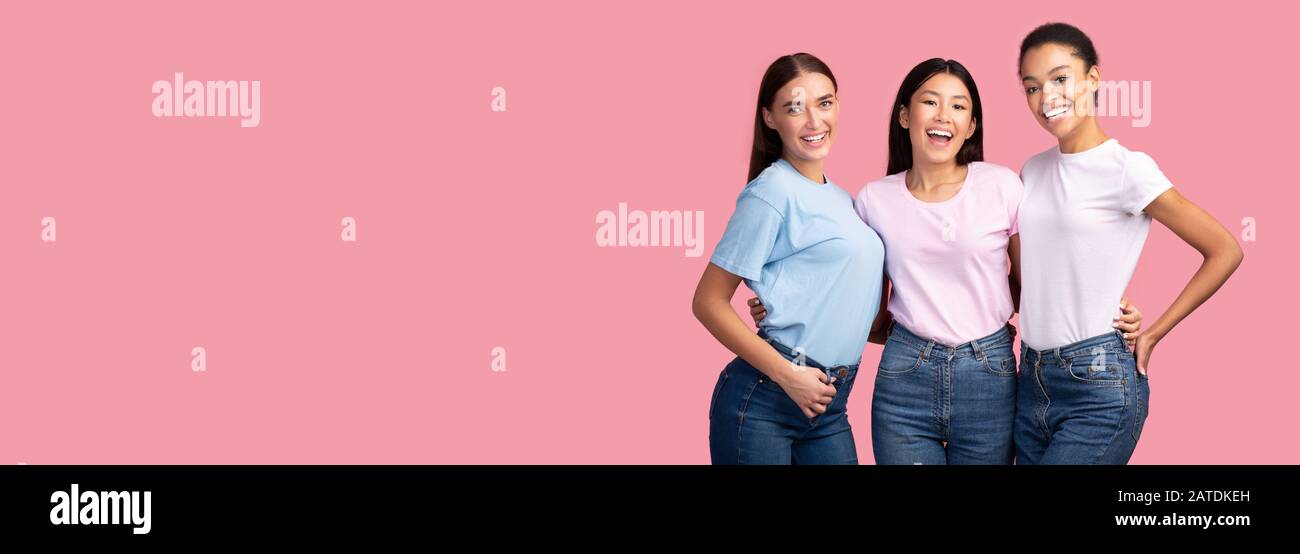 Three Models Girls Hugging Standing Over Pink Studio Background ...