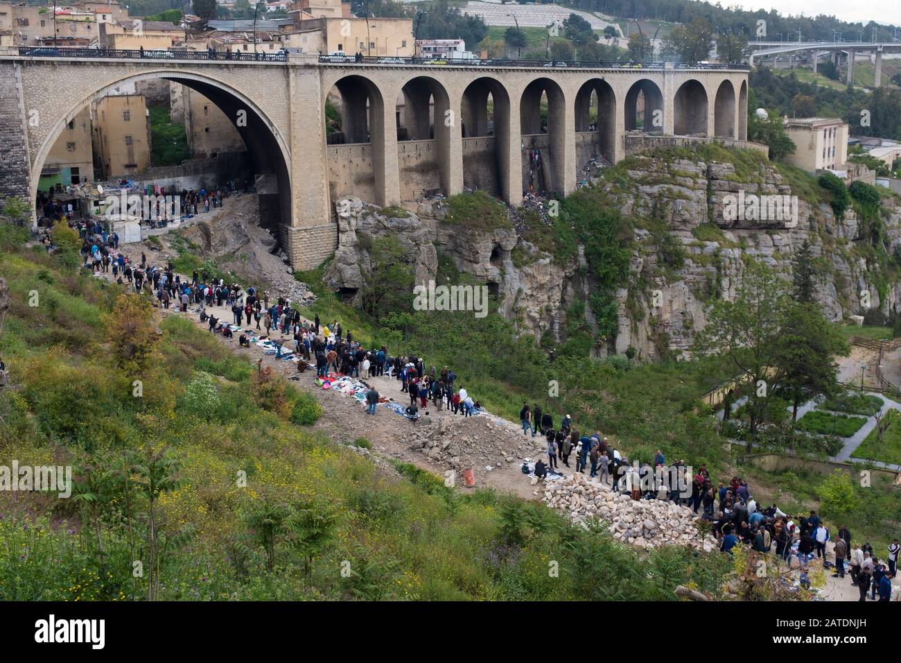 An informal market underneath The Sidi Rached Viaduct allows locals to buy and sell cheaply in Constantine, Northern Algeria. Stock Photo