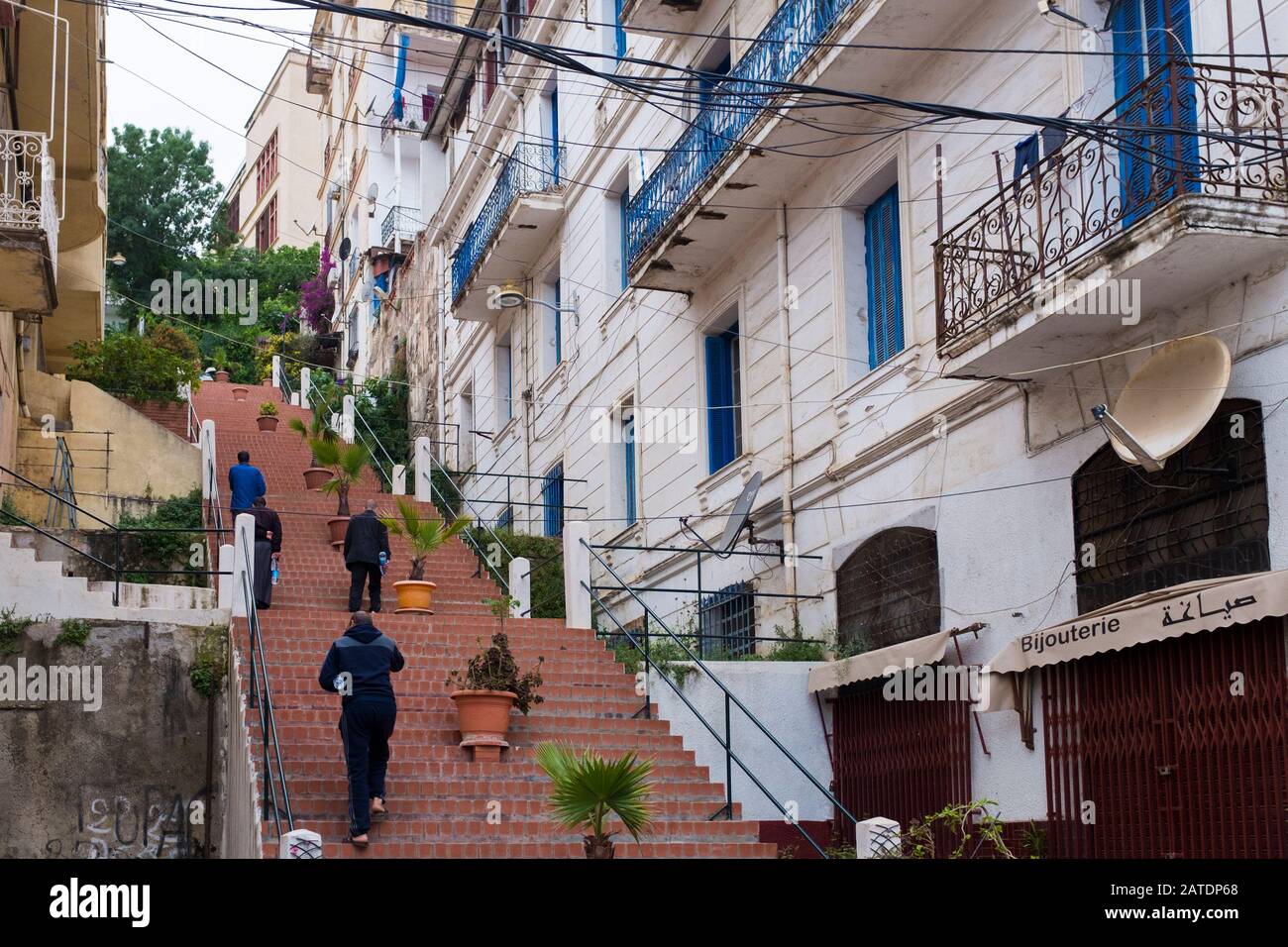 French architecture has left its blue shutters and town squares in Bejaia, a port city on the northern coast of Algeria on the Mediterranean sea. Stock Photo