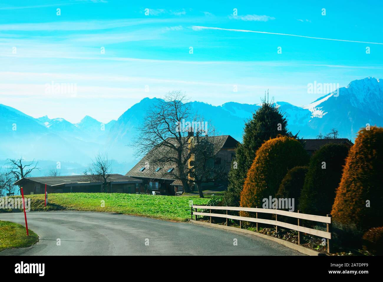 Road in Sigriswil village at Swiss Alpine mountains Thun lake Stock Photo