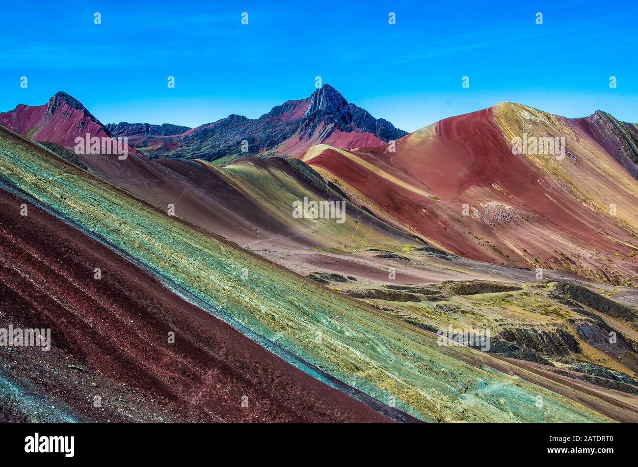 Vinicunca, Peru - Rainbow Mountain (5200 m) in Andes, Cordillera de los Andes, Cusco region in South America. Mountains Peru landscape Stock Photo